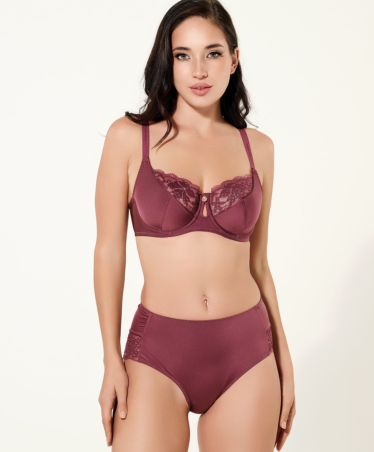 Model wearing burgundy lingerie set.