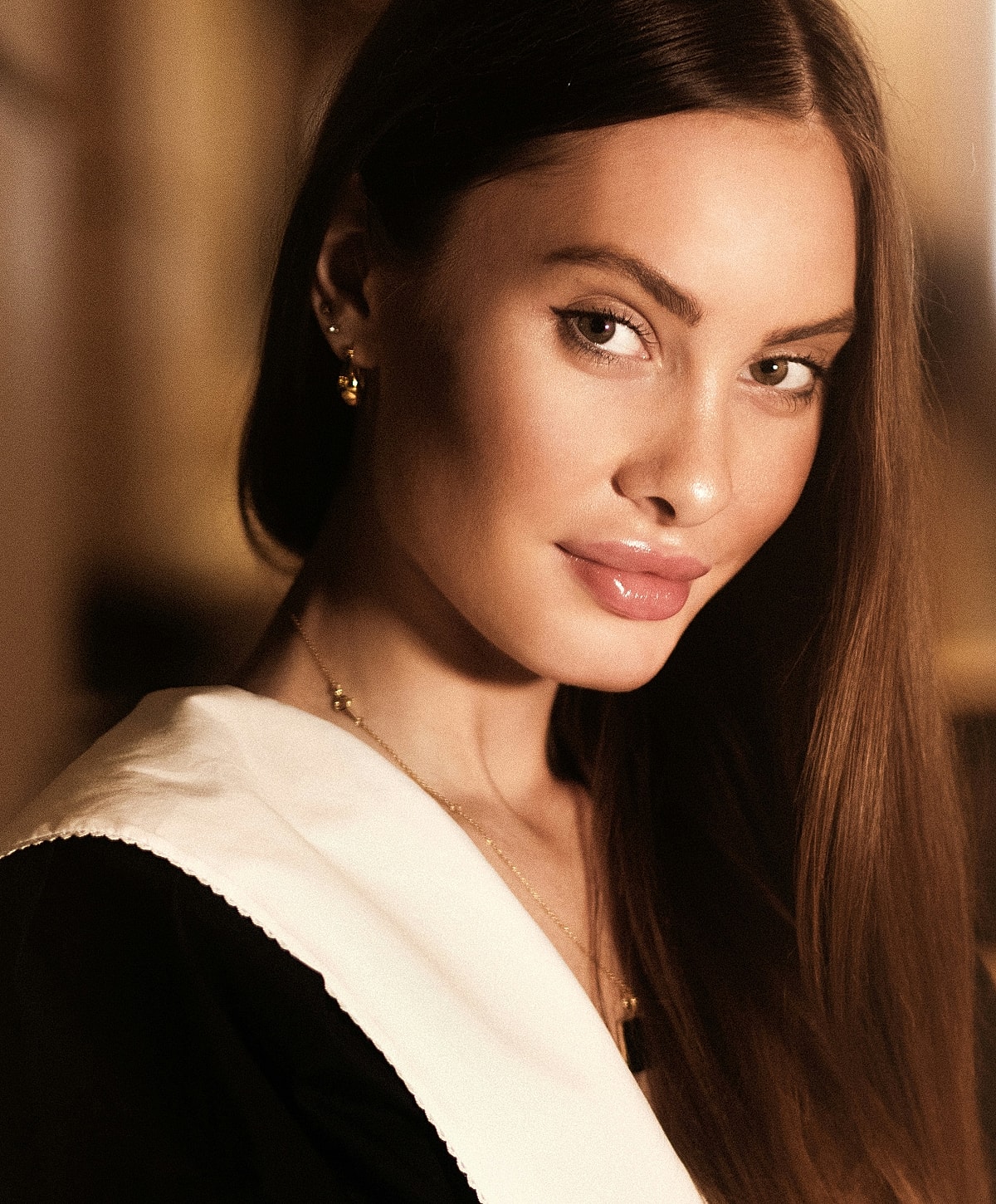 Portrait of a woman with long hair.