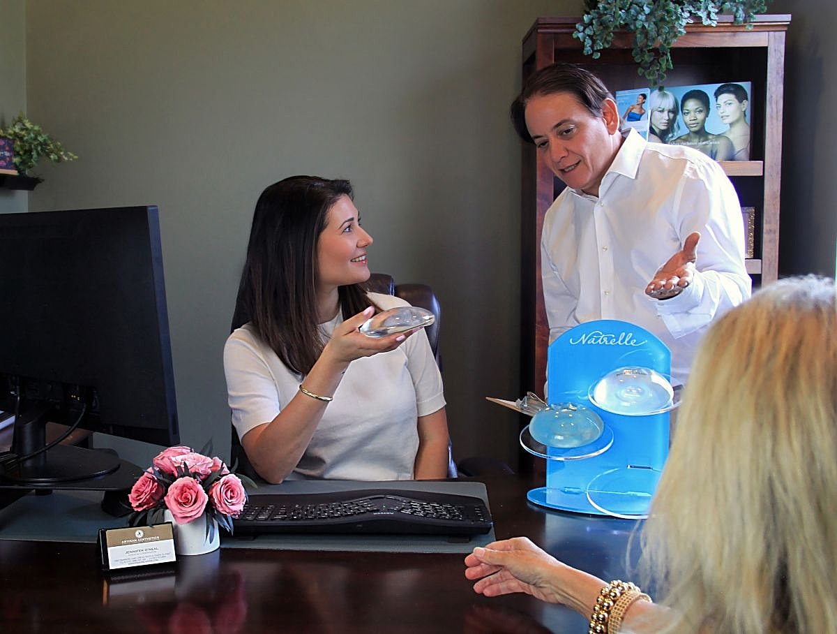 Discussion about cosmetic options in an office setting.