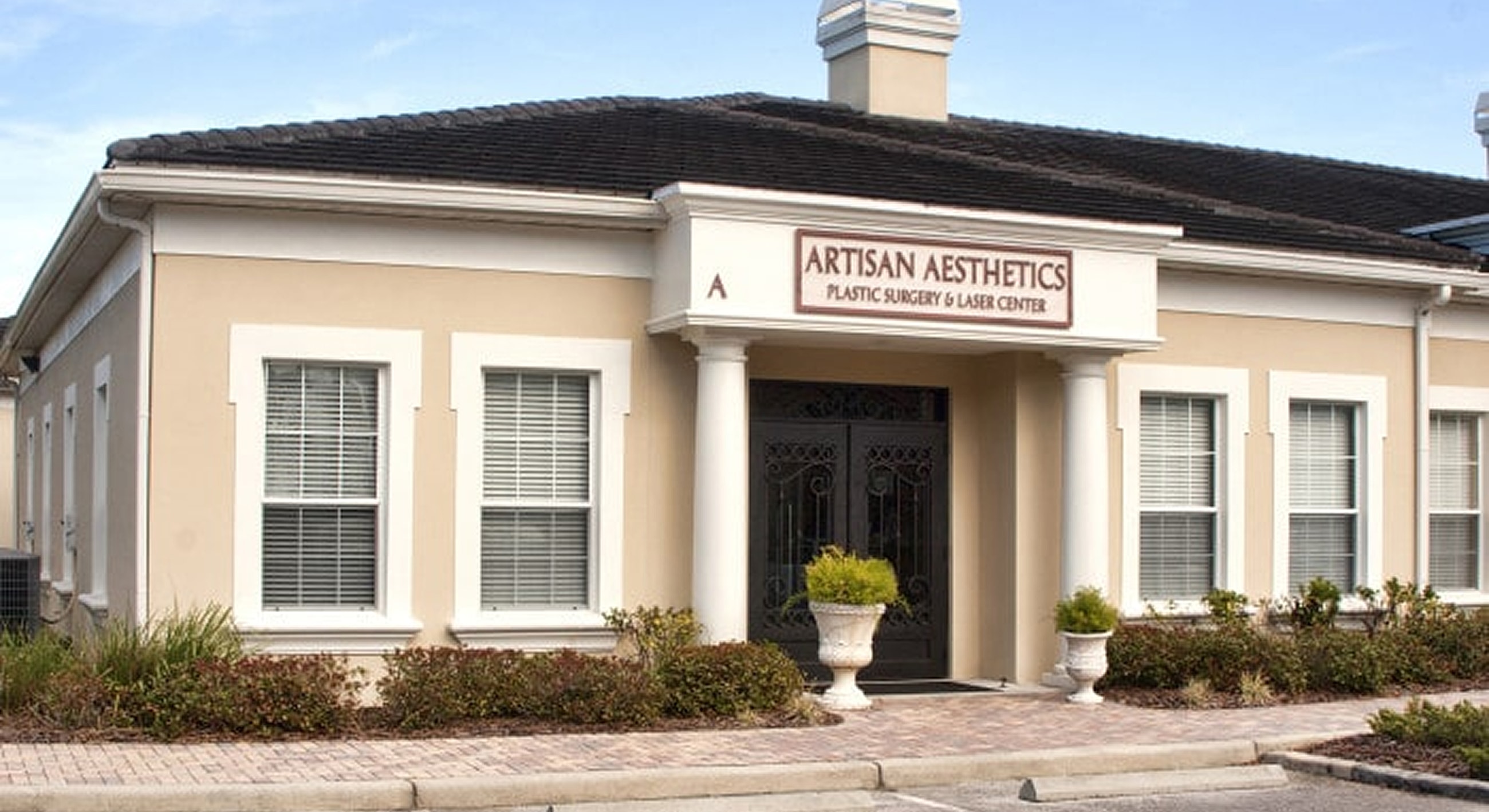 Artisan Aesthetics plastic surgery and laser center exterior.